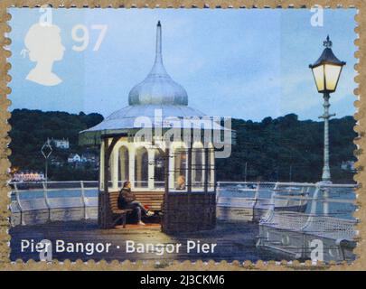 Photo of a British postage stamp with an image of Bangor Pier commemorating seaside architecture Stock Photo