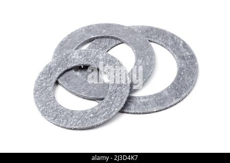 Round paronite gaskets for pipe flange connections isolated on white Stock Photo