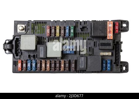 Plastic fuse box inside the engine compartment, visible fuses, relays ...