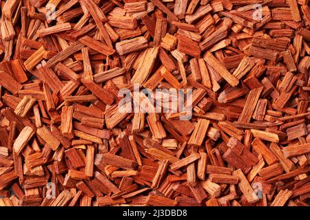 Background made of red sandalwood - ingredient for perfumes and aromatherapy Stock Photo