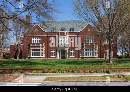CONCORD, NC, USA-3 APRIL 2022: Elegant Federal-style brick home on  Spring Street. Stock Photo