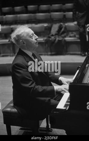 AMSTERDAM, THE NETHERLANDS - 13 February 1962 - Arthur Rubinstein in concert playing the piano. He is widely regarded as being one the finest pianists Stock Photo