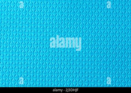 Background with rough texture of blue diamond triangles. Stock Photo