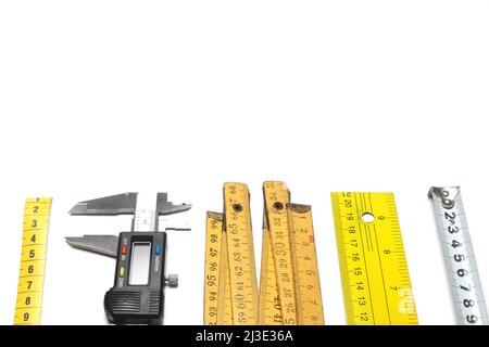Yellow Measuring tape for tool roulette or ruler. Tape measure template in centimeters. Tapes meter set isolated on black background. Stock Photo