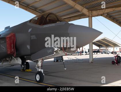 An F-35A Lightning II with the 421st Fighter Squadron sits on the flight line during Exercise Agile Tiger, April 4, 2022, Whiteman Air Force Base, Missouri. Airmen are the Air Force’s greatest and most lethal weapon systems. (U.S. Air Force photo by Senior Airman Parker J. McCauley) Stock Photo