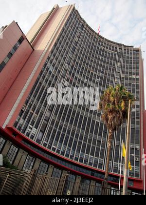 front view of Javier Alzamora Valdez Building (former Ministry of Education) is a skyscraper located in the historic center of Lima city, capital of Peru. It stands at the intersection of Abancay and Colmena avenues, next to the University Park. It went from being the headquarters of the Ministry of Education to the main premises of the Superior Court of Justice of Lima, It has a height of 86.84 m and 23 floors.2 Its construction began in 1953 and ended in 1956. Stock Photo