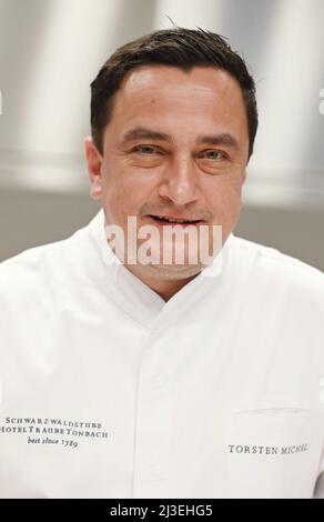 Baiersbronn, Germany. 07th Apr, 2022. Torsten Michel, head chef of the Schwarzwaldstube restaurant at the Hotel Traube Tonbach, pictured in the new restaurant kitchen. In January 2020, the main building burned down. On 08.04.2022 is the opening of the new buildings. (to dpa 'Gourmet temple Hotel 'Traube Tonbach' opens new building after fire') Credit: Uli Deck/dpa/Alamy Live News Stock Photo