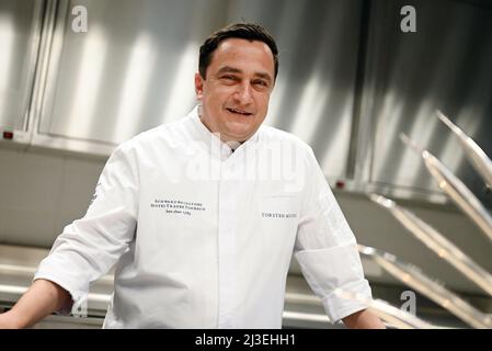 Baiersbronn, Germany. 07th Apr, 2022. Torsten Michel, head chef of the Schwarzwaldstube restaurant at the Hotel Traube Tonbach, pictured in the new restaurant kitchen. In January 2020, the main building burned down. On 08.04.2022 is the opening of the new buildings. (to dpa 'Gourmet temple Hotel 'Traube Tonbach' opens new building after fire') Credit: Uli Deck/dpa/Alamy Live News Stock Photo