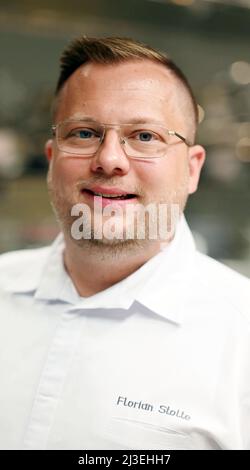 Baiersbronn, Germany. 07th Apr, 2022. Florian Stolte, head chef at Restaurant 1789, pictured in the new restaurant kitchen. In January 2020, the main building burned down. On 08.04.2022 is the opening of the new buildings. (to dpa 'Gourmet temple hotel 'Traube Tonbach' opens new building after fire') Credit: Uli Deck/dpa/Alamy Live News Stock Photo