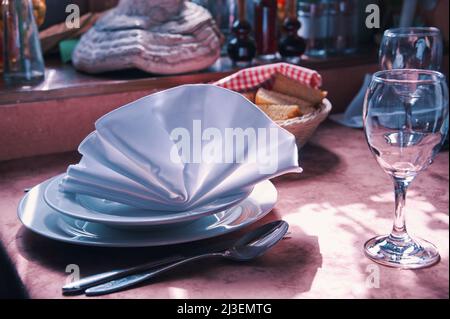 Table in restaurant served for dinner Stock Photo