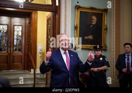 Washington, United States. 07th Apr, 2022. United States Senate Majority Leader Chuck Schumer (Democrat of New York) walks out of the Senate chamber with his thumbs up following a Senate vote to confirm Judge Ketanji Brown Jackson as an Associate Justice of the Supreme Court of the United States, at the US Capitol in Washington, DC, USA, Thursday, April 7, 2022. Judge Ketanji Brown Jackson was confirmed as an Associate Justice of the Supreme Court of the United States by a Senate vote of 53 to 47. Photo by Rod Lamkey/CNP/ABACAPRESS.COM Credit: Abaca Press/Alamy Live News Stock Photo