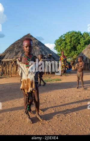 Turmi, Omo River Valley, Ethiopia - May 10, 2019: Portrait of a teenager in Hamar village. Hamars are the original tribe in southwestern Ethiopia. Sou Stock Photo