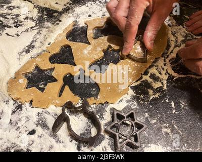 The process of making gingerbread cookies with molds for Easter Stock Photo