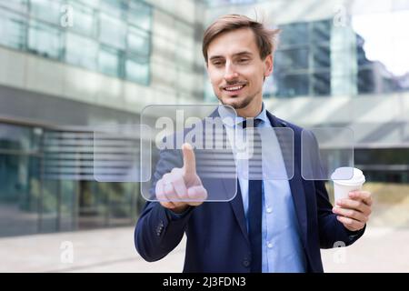 Man pressing icons on virtual touchscreen Stock Photo