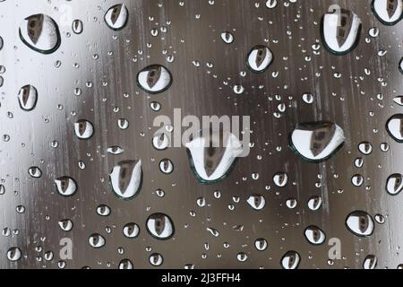 Halberstadt, Germany. 08th Apr, 2022. Halberstadt Cathedral reflected in raindrops on a car window pane. Unstable weather with rain and wind determine the weather situation in Saxony-Anhalt in the next few days. Credit: Matthias Bein/dpa/Ģ����ý Live News Stock Photo