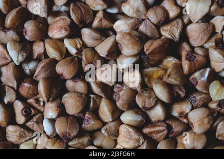 Close-up natural buckwheat textured background Stock Photo