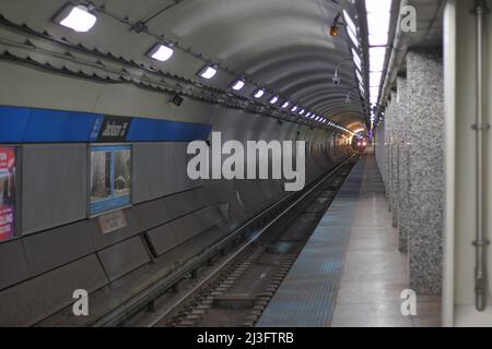 Worn and weathered old Chicago CTA public train station subway tunnel deep underground. Stock Photo