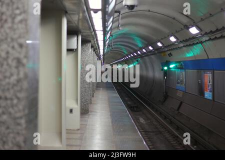 Worn and weathered old Chicago CTA public train station subway tunnel deep underground. Stock Photo