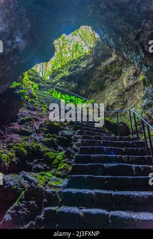 Steep staircase leading to gruta das torres cave at Pico island, Azores, Portugal. Stock Photo