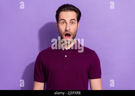 Portrait of terrified amazed impressed male yelling got in big problem trouble isolated on purple color background Stock Photo