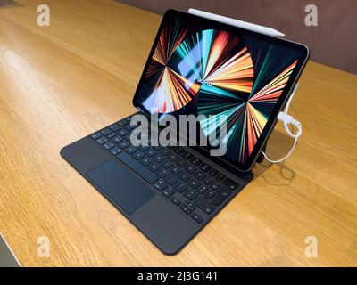 Paris, France - Ap 7, 2022: New Apple Computers iPad Pro tablet on the iconic Magic Keyboard Stock Photo