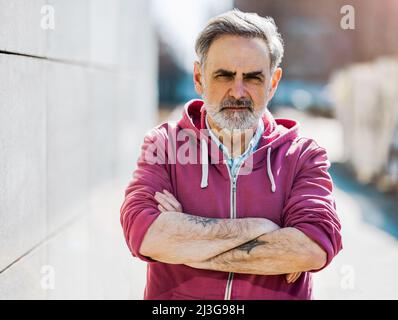 Mature man outdoors in the city Stock Photo