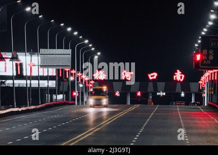 (220408) -- CHANGCHUN, April 8, 2022 (Xinhua) -- A school bus transporting supportive team members comes back from Changchun to Meihekou City, northeast China's Jilin Province, April 3, 2022. Some 5,000 supportive staff from Meihekou City who are aiding Changchun, one of the hardest-hit cities in China amid the latest virus resurgence, commute between the two cities every day in order to lessen boarding and lodging burdens on Changchun. The supportive team members, including medics, government officials and police officers, start off early morning and get back in late night, both by taking fer Stock Photo