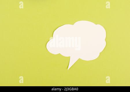 White cloud on a green background, empty copy space for text, communication and marketing concept, being connected, networking Stock Photo