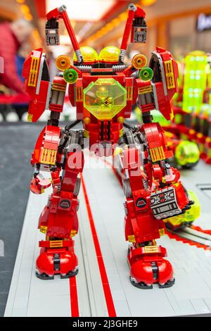 red robot toy in a lego exhibition close up Stock Photo