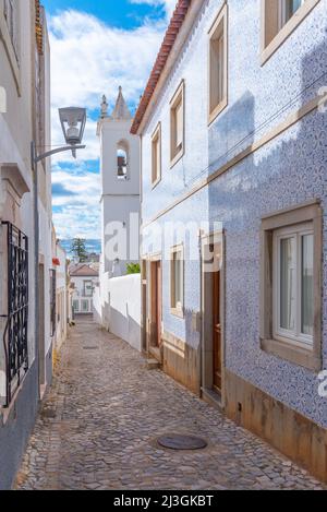 Narrow street of the old town at Portuguese town Tavira. Stock Photo