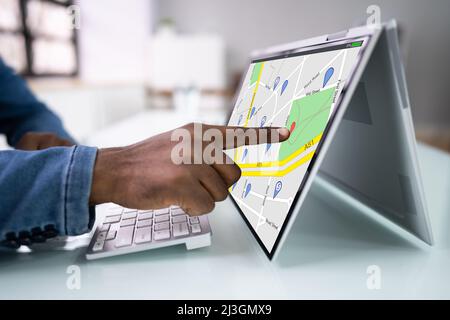 GPS Location Map Search Online On Laptop Stock Photo
