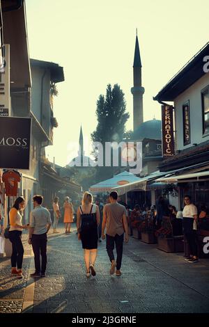 SARAJEVO, BOSNIA AND HERZEGOVINA - JULY 14, 2018: tourists walking on street of Old Town Stock Photo