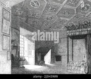 Mary Queen of Scots' Room at Holyrood, 1850. Interior of the royal Palace of Holyrood, Edinburgh, Scotland. 'The ceiling, as far as the moulded compartments are concerned, is in its original character...The compartments...are of diamond and hexagonal form, the diamond spaces containing circles, whence issue four sceptres, the circles having &quot;J.R.&quot; and &quot;M. R.&quot; in them alternately. The hexagons are ornamented by painted borders, with the St. Andrew's Cross, St. George's Cross, the portcullis, the harp, the rose, and the crests of England and Scotland...The bedstead, covered w Stock Photo
