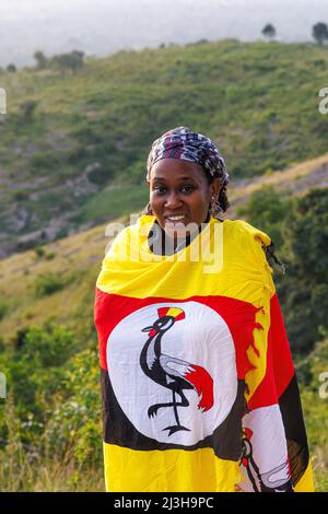 Uganda, Mbarara district, Mburo, woman wrapped in the Ugandan flag Stock Photo