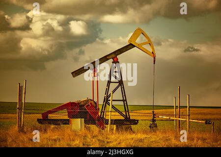 Oil production with a deep pump on land in Bulgaria Stock Photo