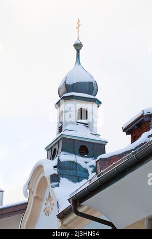 Bell tower on the pilgrim house in Mittenwald, Upper Bavaria Stock Photo