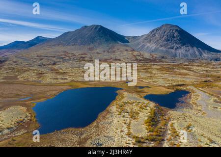Aerial view over the Norwegian tundra in autumn / fall showing lakes and mountains, Innlandet, Eastern Norway Stock Photo