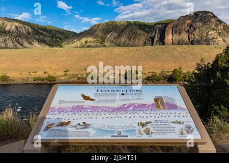 Interpretive sign for Devil's Slide on Cinnabar Mountain and the winter range of animals in Yellowstone National Park, USA [No artist copyright releas Stock Photo