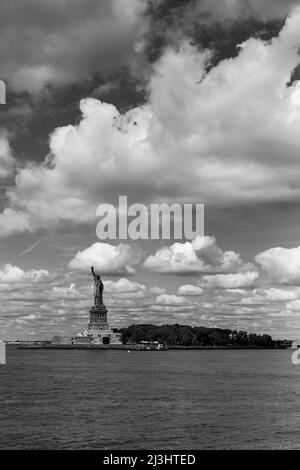 New York City, NY, USA, View of island of Liberty with statue of Liberty seen from the ferry on the Hudson river, symbol of the New York City Stock Photo