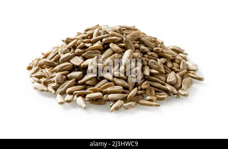 Pile of shelled raw sunflower seeds isolated on a white background. Healthy eating and gluten free dieting ingredient. Antioxidant organic snack. Stock Photo