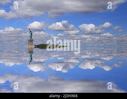 Liberty Island, NYC, NEW York, USA, An unexpected view of the world famous Statue of Liberty in New York City. Captured against a dramatic sky. Stock Photo