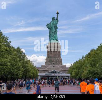 Liberty Island, NYC, NEW York, USA, An unexpected view of the world famous Statue of Liberty in New York City. Captured against a dramatic sky. Stock Photo