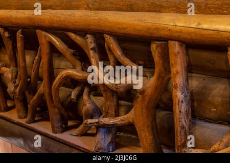 Interior rustic branch details of Old Faithful Inn in Yellowstone National Park, Wyoming, USA Stock Photo