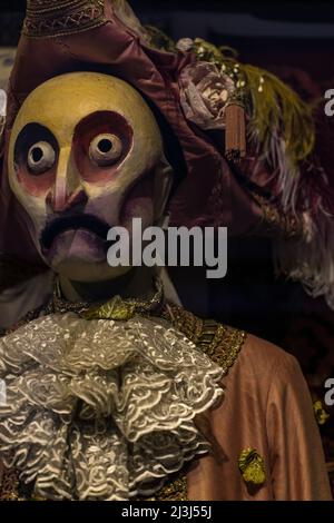 Creepy Venetian wooden doll in Venice, Italy Stock Photo