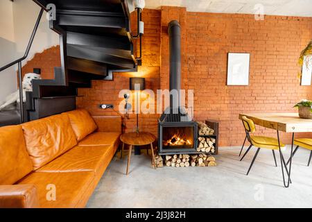 Cozy living room interior in loft style Stock Photo