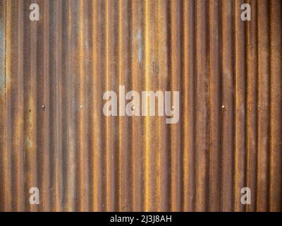 Old zinc wall texture background, rusty on galvanized metal panel sheeting. Stock Photo
