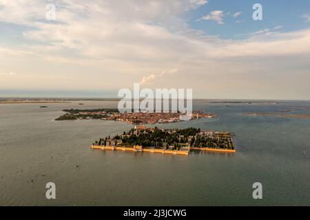 Aerial photo of historic Saint Michele cemetery island near Murano and Venice, Italy Stock Photo