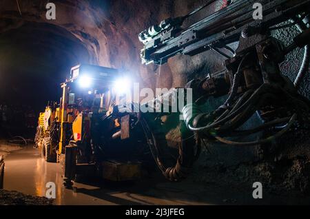 Jumbo Drill Posing at Underground Mine Stock Photo