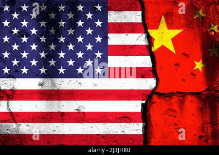 United States and China crisis. Background with national flags on cracked wall