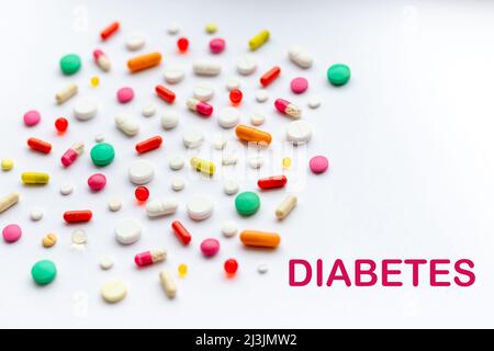 Many different pills and space for text on colorful background, top view. Different pills Stock Photo